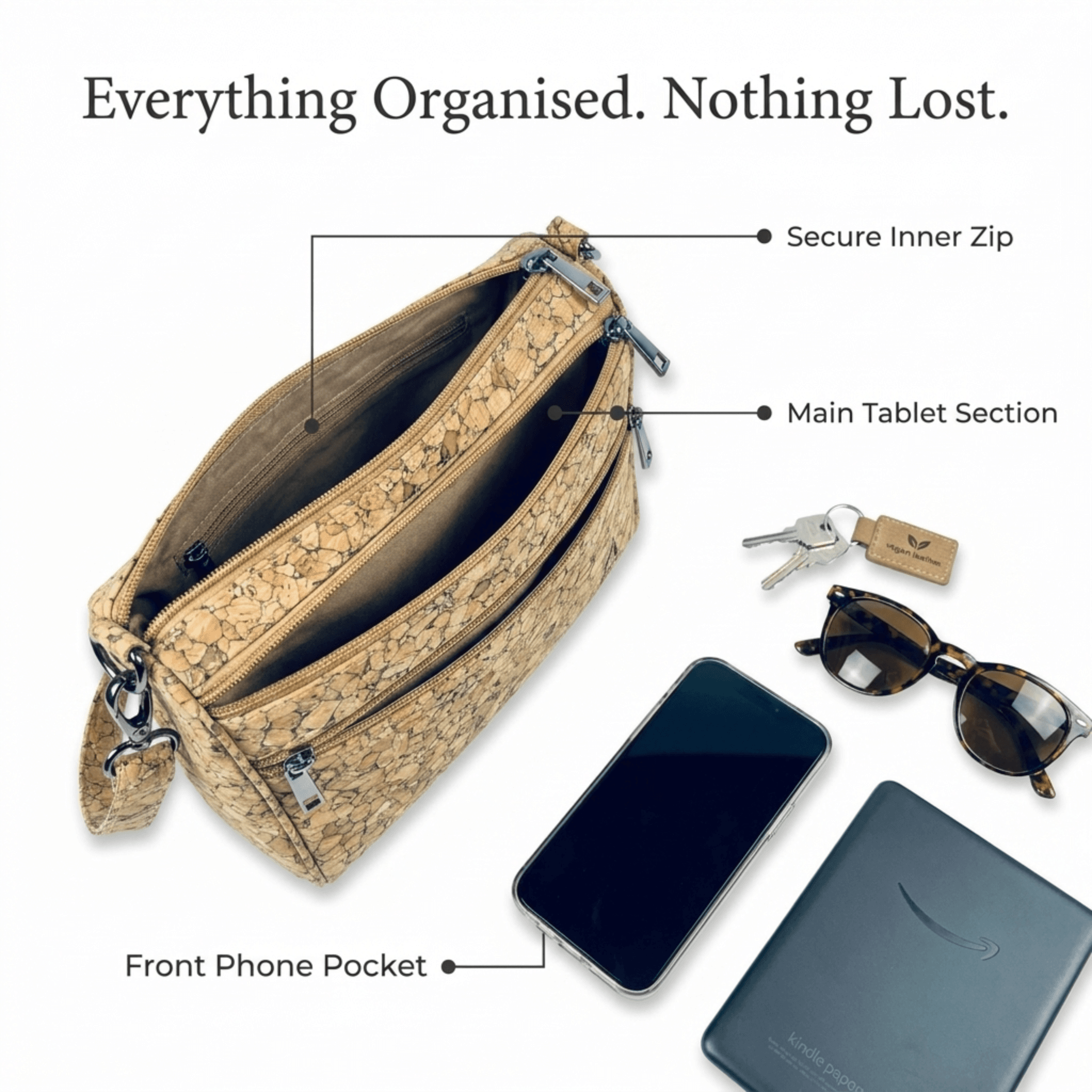 Diagonal view of a beige patterned handbag showing multiple zippered compartments and a front phone pocket.